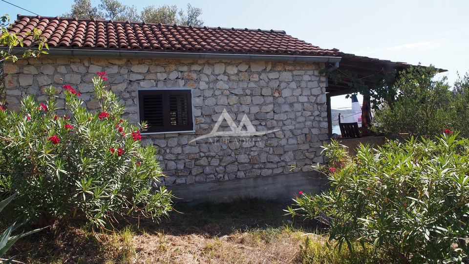 MALA RAVA - CHARMING STONE HOUSE FOR SALE IN THE FIRST ROW TO THE SEA